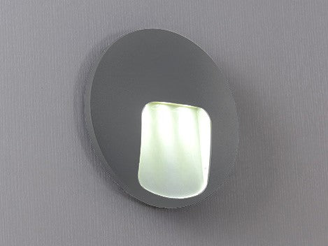 Nahaufnahme einer runden LED-Wandleuchte mit neutralweißem Licht